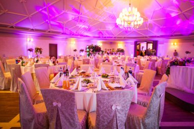 and decorated tables with food