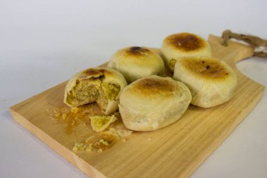 bakpia cake is indonesia-china traditional food from yogyakarta. isolated on white background. bakpia pathok or sweet rolls