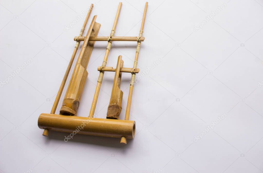Angklung, the traditional sundanese musical instrument made from bamboo. Isolated on white background