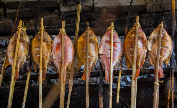 grilled fish, grilled fish nile Tilapia grilled on hot charcoal