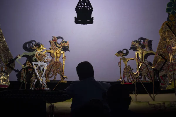 wayang kulit or shadow puppets from Java, Indonesia puppet show by dalang or puppeteer . Wayang made from leather