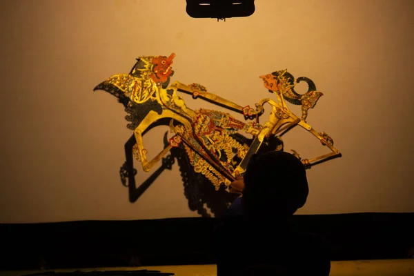 wayang kulit or shadow puppets from Java, Indonesia puppet show by dalang or puppeteer . Wayang made from leather