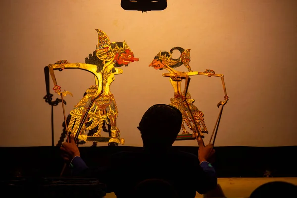 wayang kulit or shadow puppets from Java, Indonesia puppet show by dalang or puppeteer . Wayang made from leather