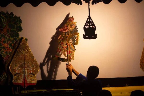 wayang kulit or shadow puppets from Java, Indonesia puppet show by dalang or puppeteer . Wayang made from leather