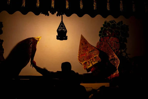 wayang kulit or shadow puppets from Java, Indonesia puppet show by dalang or puppeteer . Wayang made from leather