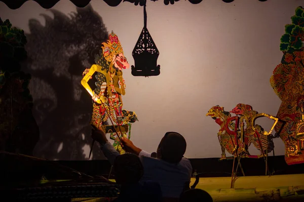 wayang kulit or shadow puppets from Java, Indonesia puppet show by dalang or puppeteer . Wayang made from leather