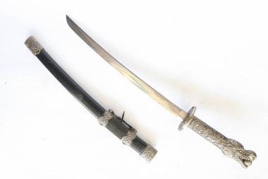 Japanese samurai short sword wakizashi , with dragon ornament, isolated on white background