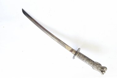 Japanese samurai short sword wakizashi , with dragon ornament, isolated on white background