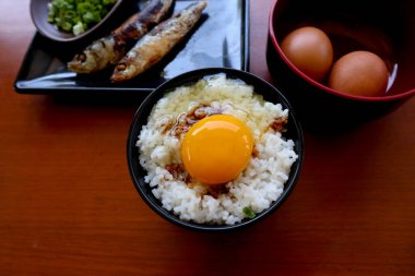 tamago kake gohan or raw egg on rice. traditional food from japan, eat on breakfast