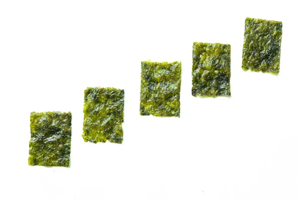 nori seaweed isolated on white background. Japanese food nori. Dry seaweed sheets.