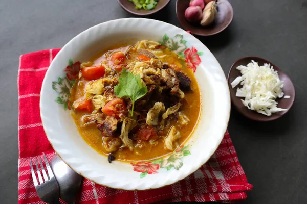 Goat Curry or gulai kambing, food from asia. Delicious goat meat curry served in a bowl