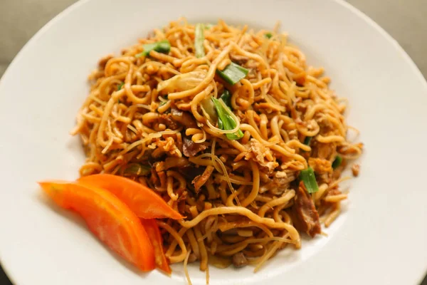 yakisoba is traditional stir fried noodle japan, made from noodles, cabbage, vegetables and meat, seasoning with oyster sauce or yakisoba sauce. yakisoba served on plate