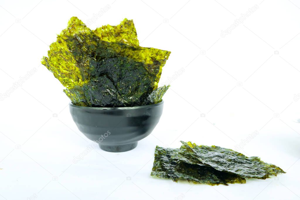 nori seaweed isolated on white background. Japanese food nori. Dry seaweed sheets.