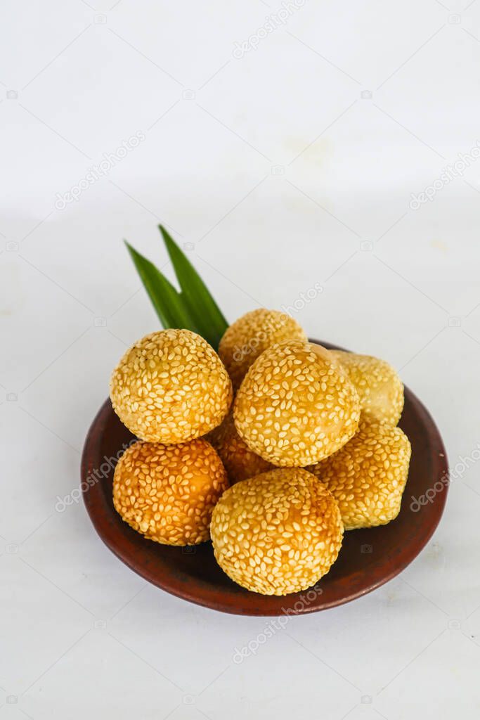 onde-onde or sesame ball or Jian Dui  is fried Chinese pastry made from glutinous rice flour and coated with sesame seeds filled with bean paste.isolated on white background