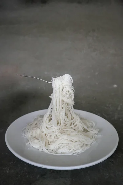 bihun or vermicelli or rice noodles or angel hair isolated on black background