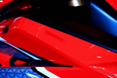 Racing motorcycle wrap red black. Custom illustrated vehicle stripe decal design kit for sides motorcycle, Sharp pointy geometric wing design.