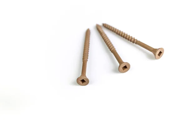 Brown Deck Screws Isolated on a White Background — Photo