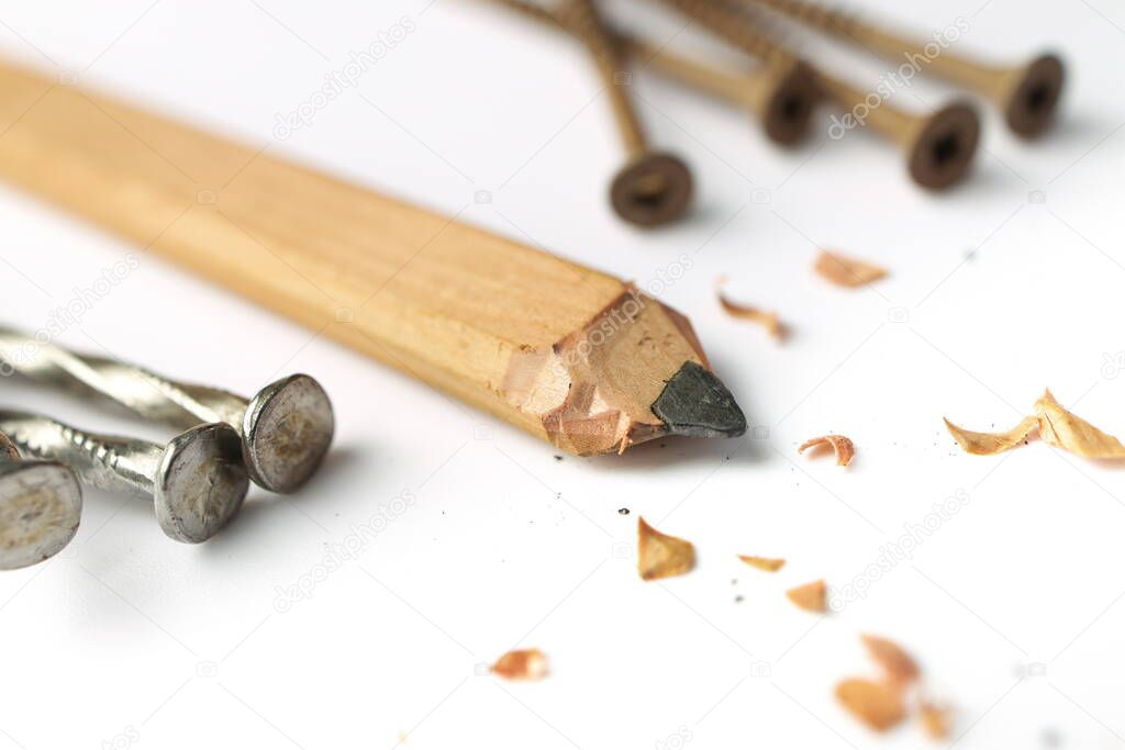 Carpenters Pencil with Sharpening Shavings, Framing Nails and Deck Screws