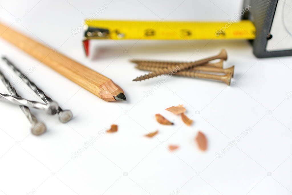 Carpenters Pencil with Sharpening Shavings, Tape Measure, Framing Nails and Deck Screws