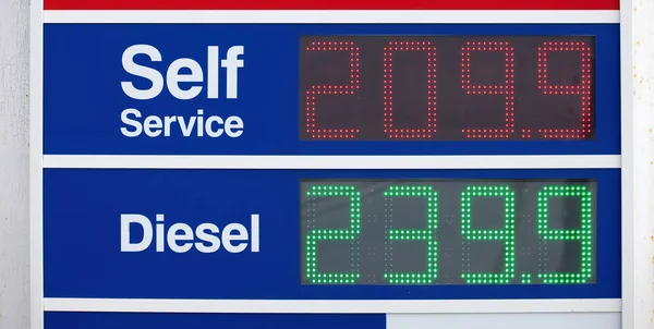 Gas pump prices in Ontario Canada rise and soar to 209.9.9 per liter litre for regular unleaded — Stock Photo, Image