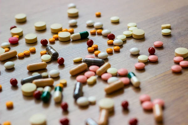 Léky Tablety Dřevěných Texture Stůl — Stock fotografie