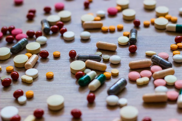 Medicamentos Tabletas Una Mesa Textura Madera — Foto de Stock