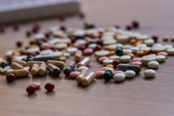 Medicamentos Tabletas Una Mesa Textura Madera — Foto de Stock