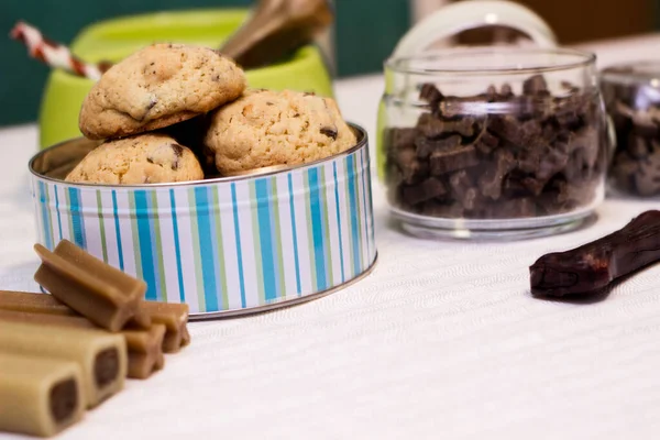 Dog treats spilling out of bowl. Dog treats and biscuits