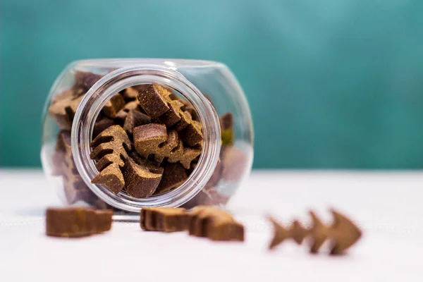 Treats in a jar for pets. Cats and dogs treats and biscuits