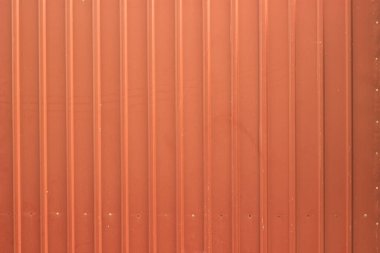 Turuncu metal kapaklı arka plan. Turuncu garaj kapısı, metal malzeme, çelik.