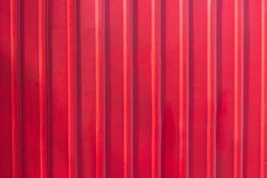 Kırmızı metal kepenk kapağı arka planı. Kırmızı garaj kapısı, metal malzeme, çelik.