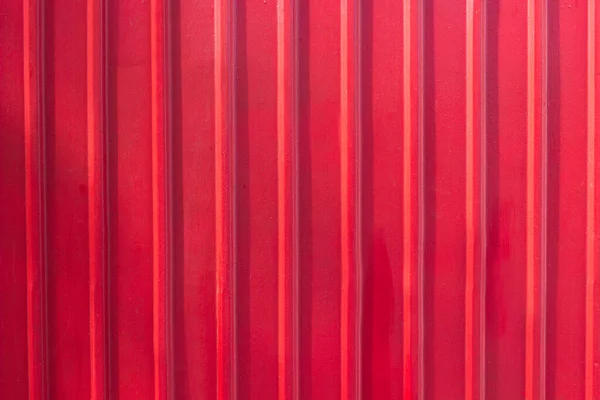 Red metal shutter door background. Red garage gate, metal material, steel