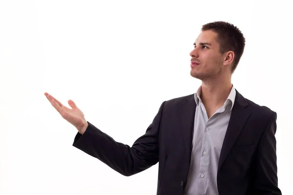 Joven Empresario Sosteniendo Pluma Mano Presentando Aislado Sobre Blanco — Foto de Stock