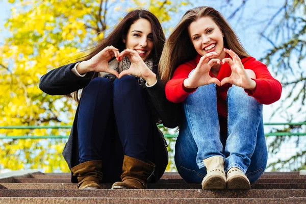 Two Young Smiling Friends Sitting Stairs Autumn — Φωτογραφία Αρχείου