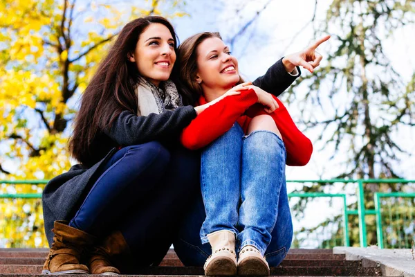 Two Young Smiling Friends Sitting Stairs Autumn —  Fotos de Stock