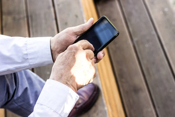 Unrecognizable Businessman Using Mobile Phone —  Fotos de Stock