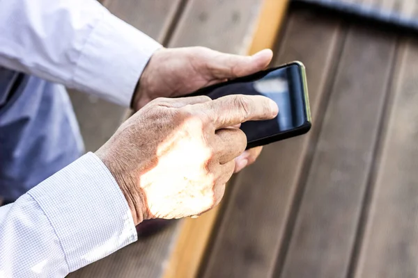 Unrecognizable Businessman Using Mobile Phone —  Fotos de Stock