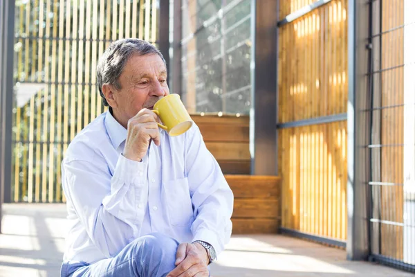 Smiling Senior Man Enjoying Morning Coffee —  Fotos de Stock