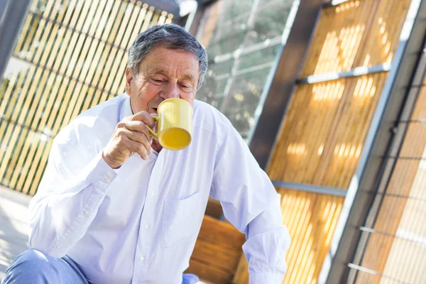 Smiling Senior Man Enjoying Morning Coffee —  Fotos de Stock