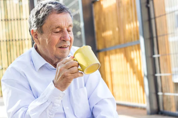 Smiling Senior Man Enjoying Morning Coffee —  Fotos de Stock