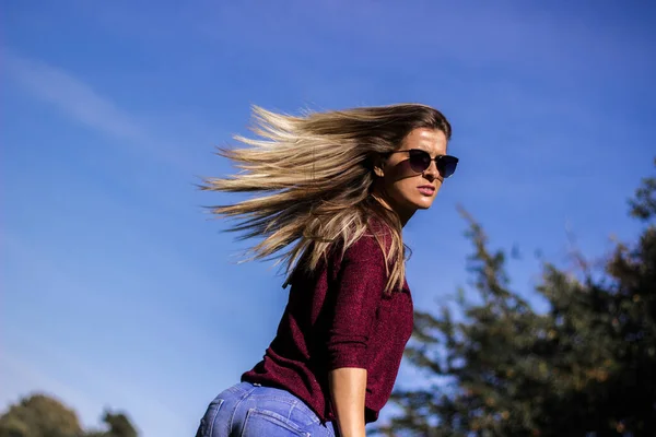 Back view of long haired woman