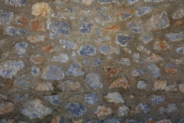 Çelik duvar arka planı. Ve aşırı kullanılmış beton oranı olan taş bir duvar..