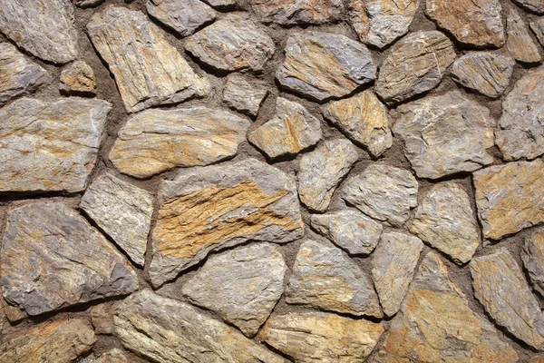 Sullo Sfondo Del Muro Pietra Muro Pietra Realizzato Cemento Vicino — Foto Stock
