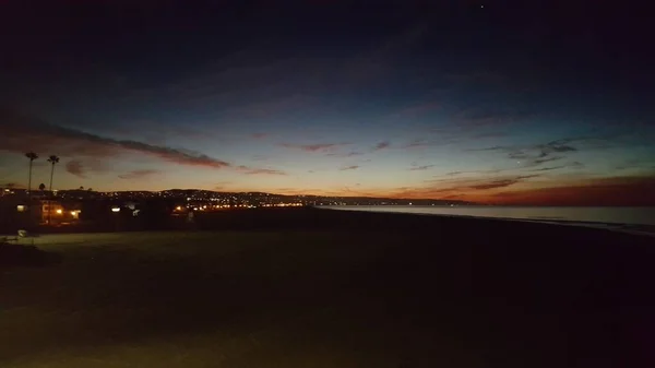 California - New Port Beach in the early morning surrounded by a beautiful and peaceful ocean