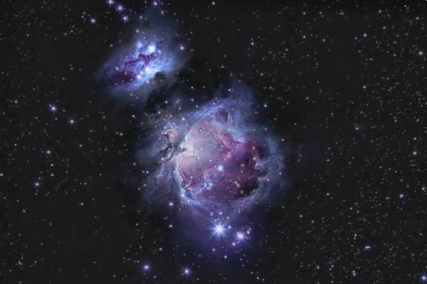 Orion Bulutsusu M42 veya NGC 1976 yıldızlı gece gökyüzünde derin uzay emisyon bulutsusu