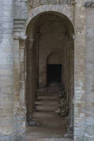 Corridor with arches in ruin of the monastery with the Abbey Jumieges, Normandy, France