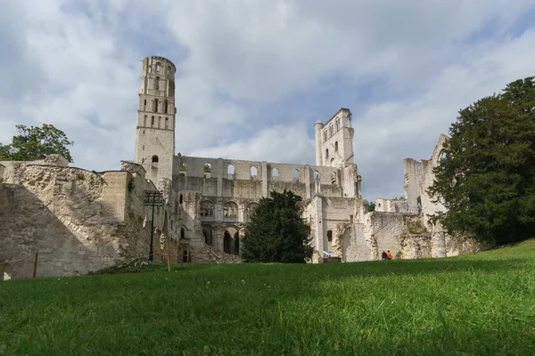 Ruin of the monastery with the Abbey Jumieges with green meadow in front, Normandy, France
