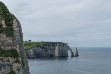 The cliff of Falaise d'Aval on a summer day in Etretat, Normandy, France