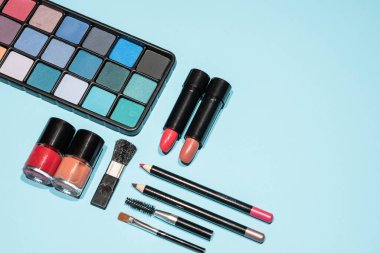 Makeup, lipstick and brushes ready to use