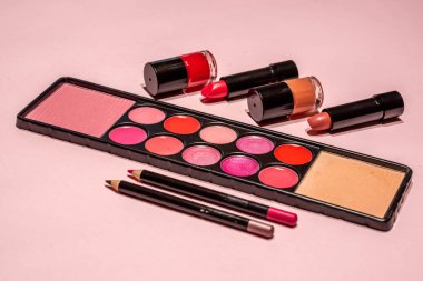 Makeup, lipstick and brushes ready to use